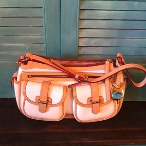 Dooney & Bourke pebbled leather saddlebag.